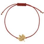 Bransoletka na jesień na sznurku liść klonu srebrna pozlacana Bransoletka na jesień z liściem klonu srebrna pozłacana na bordowym sznurku