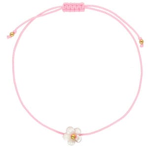 Damska bransoletka na różowym sznurku z kwiatkiem z masy perłowej i srebra pozłacanego