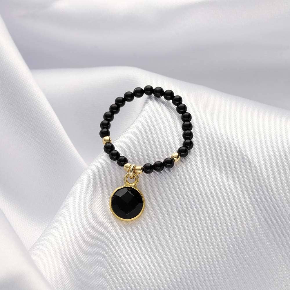 Pierścionek elastyczny z onyksem czarnym w srebrnej oprawie