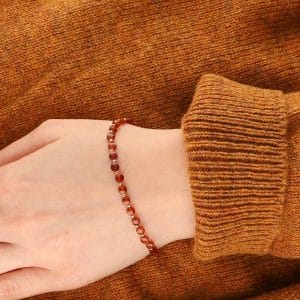 Damska srebrna pozłacana bransoletka w rudym kolorze z granatem CINNAMON