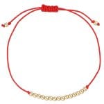 Damska bransoletka na czerwonym sznurku z pozłacanymi srebrnymi kuleczkami