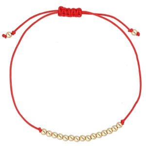 Damska bransoletka na czerwonym sznurku z pozłacanymi srebrnymi kuleczkami
