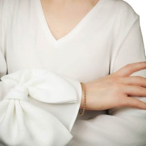 Damska bransoletka z kuleczek gold filled na ręce