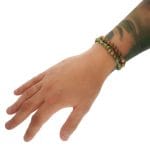 Zestaw zielono brązowych bransoletek męskich z jaspisu z elementami ze srebra które są założone na ręce