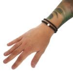 Srebrna bransoletka męska z czarnego onyksu oraz srebrnego krzyża pokoju na ręce razem z podstawową bransoletką męską z kulkami rozmiaru 4mm