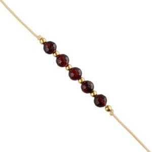 Bransoletka na beżowym sznureczku z granatem srebrna pozłacana na ręce