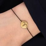 Bransoletka dla Barana na sznurku z celebrytką. Bransoletka srebrna pozłacana idealna dla Barana na ręce