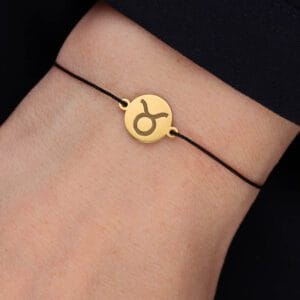 Bransoletka dla Byka na sznurku z celebrytką. Bransoletka srebrna pozłacana idealna dla Byka na ręce