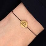Bransoletka dla Wagi na sznurku z celebrytką. Bransoletka srebrna pozłacana idealna dla Wagi na ręce