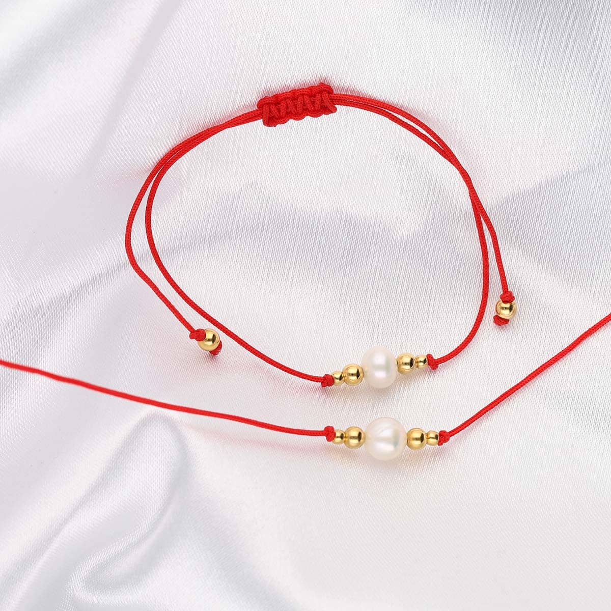 Biżuteria na sznurku czerwonym. Bransoletka i choker na szyję z perłą