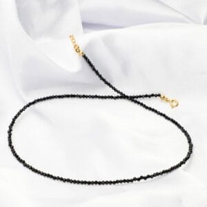 Zjawiskowy i elegancki choker na szyję czarny spinel fasetowany srebrny pozłacany