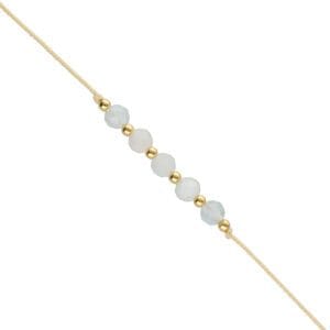 Bransoletka beżowa sznurkowa z niebieskim kamieniem akwamaryn