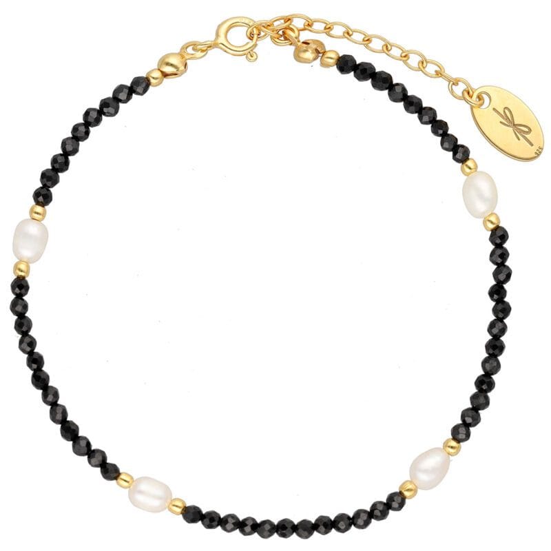 damska bransoletka czarny spinel perła pozłacana. Elementy wykonane ze srebra 925.
