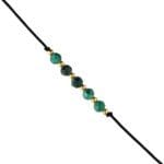Damska bransoletka malachit naturalny na czarnym sznurku z kuleczkami ze srebra pozłacanego 925