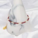 Bransoletka damska z kamieniem granat i kwarc różowy. Bransoletka srebrna pozłacana regulowana położona na soplu