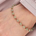 Bransoletka z zielonym awenturynem, granatem i srebrem pozłacanym na ręce