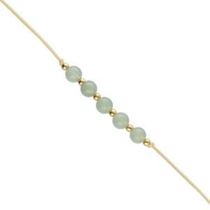 Bransoletka na beżowym sznureczku z zielonym kamieniem awenturyn