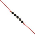 Czerwona sznurkowa bransoletka z onyksem z kuleczkami ze srebra pozłacanego 925
