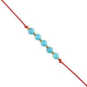 Bransoletka na czerwonym sznureczku z niebieskim kamieniem turkus