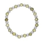 Pierścionek damski na gumce srebrny z kuleczkami zielonych fasetowanych cyrkonii