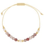 Damska bransoletka na beżowym sznurku z kuleczkami kwarcu i pozłacanymi srebrnymi przekładkami