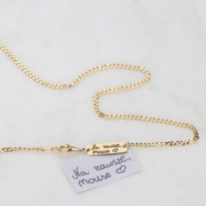 Srebrny pozłacany naszyjnik męski z grawerem przy zapięciu