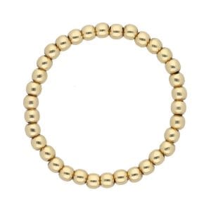 Piękny złoty pierścionek elastyczny z kuleczek złota